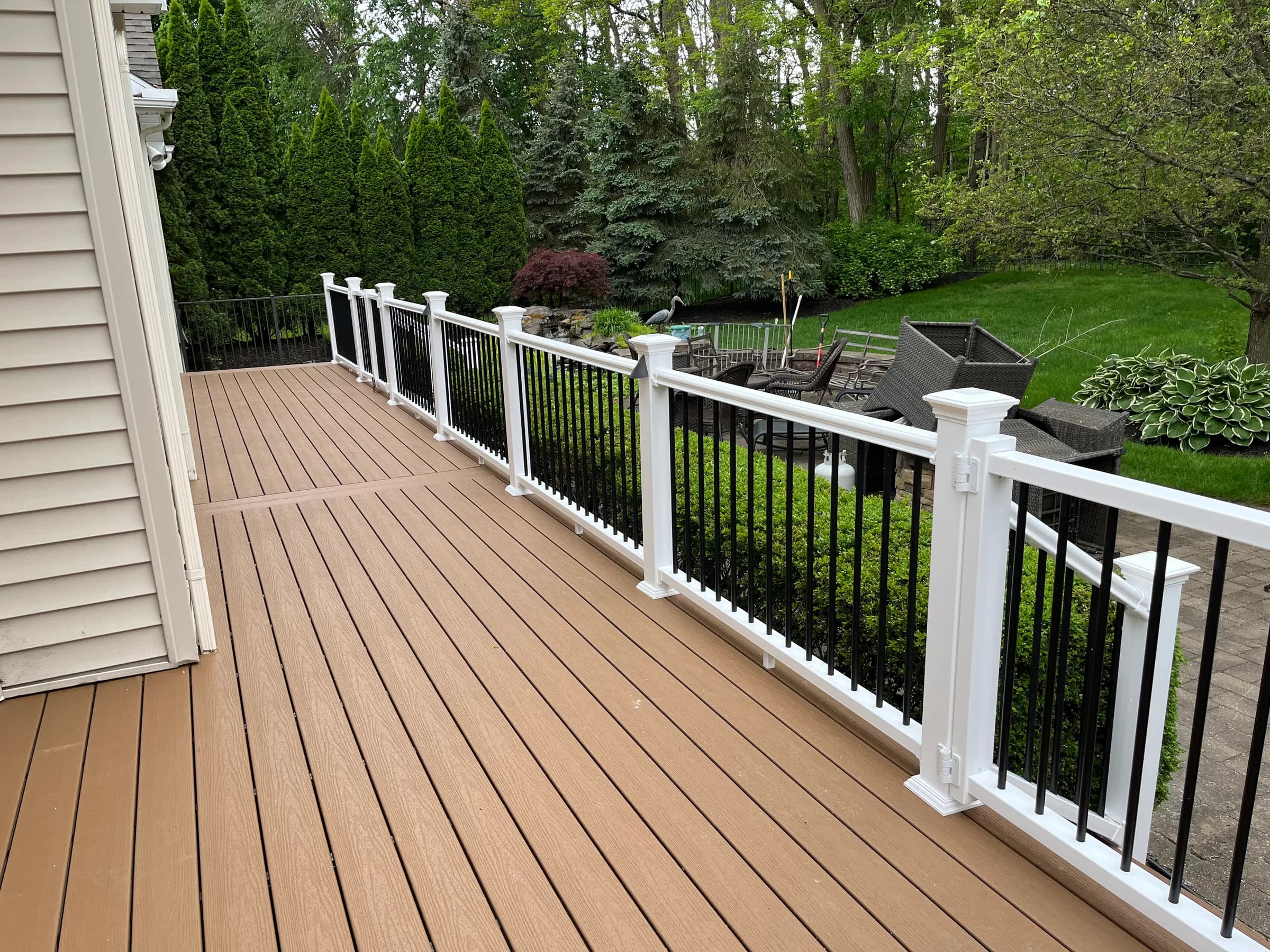Tan composite deck walkway to door