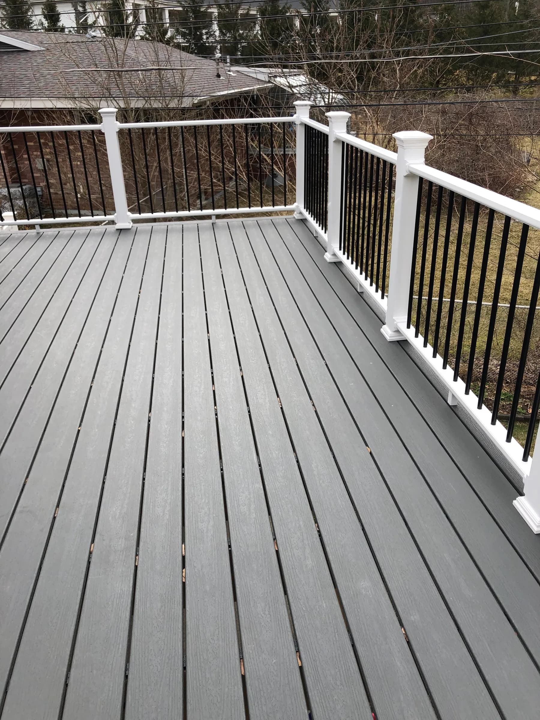 Gray composite elevated deck with view
