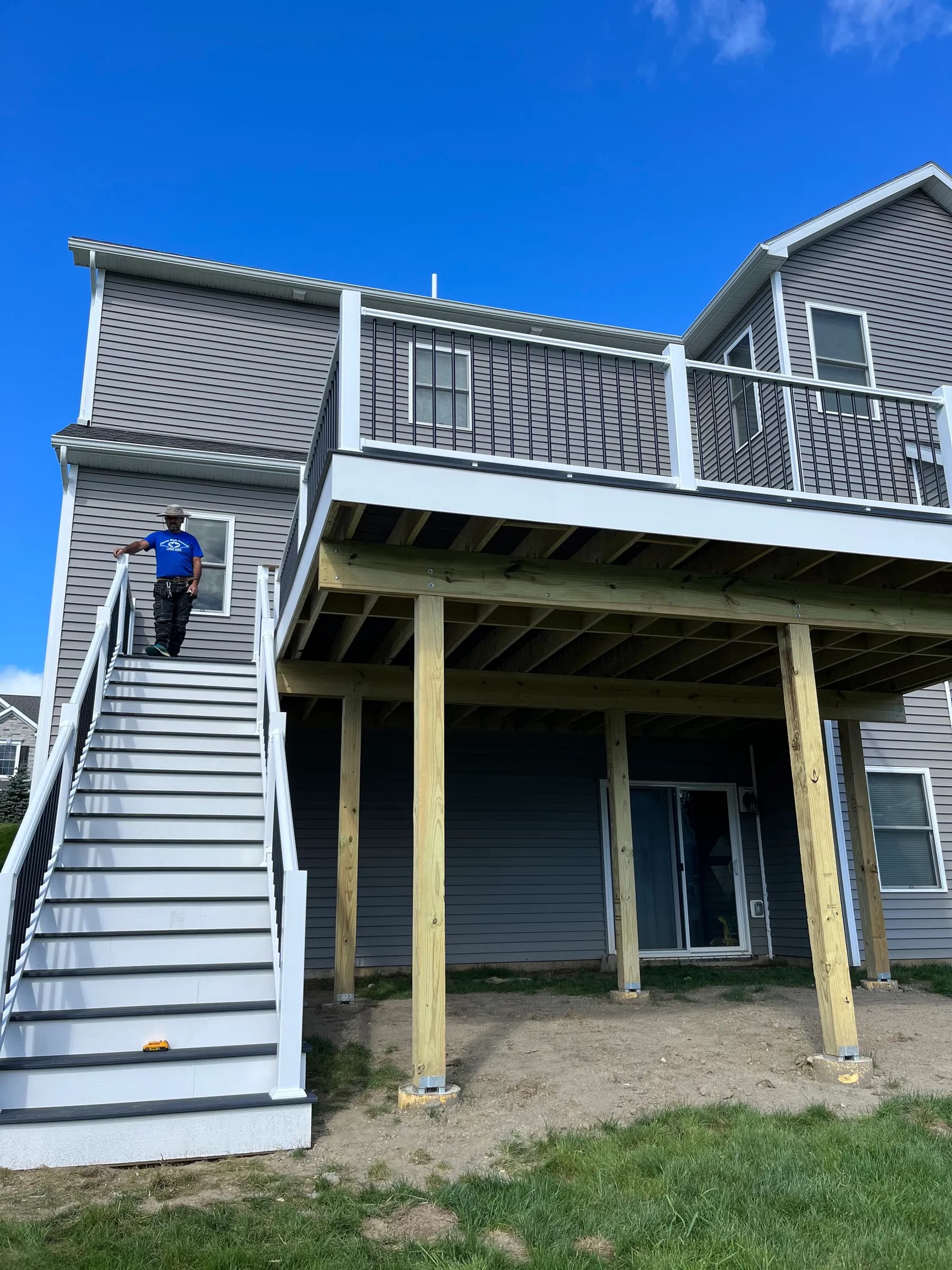 Under-deck framing with pressure-treated posts